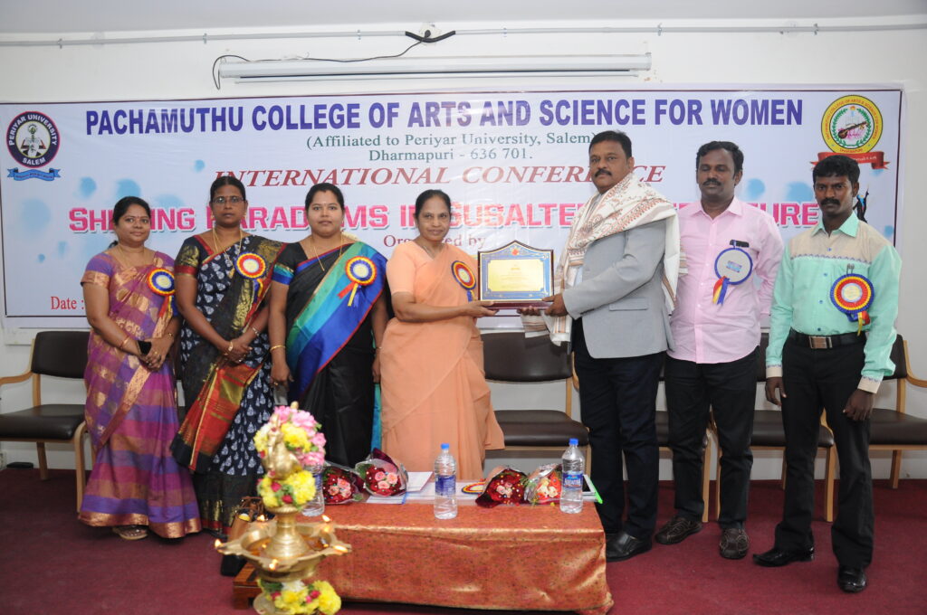Prof. S. Joseph Nehru receiving an award at an international academic conference
